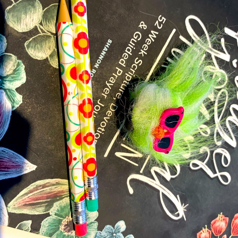 Two mechanical pencils and a kachooz mega moops pencil topper collectible